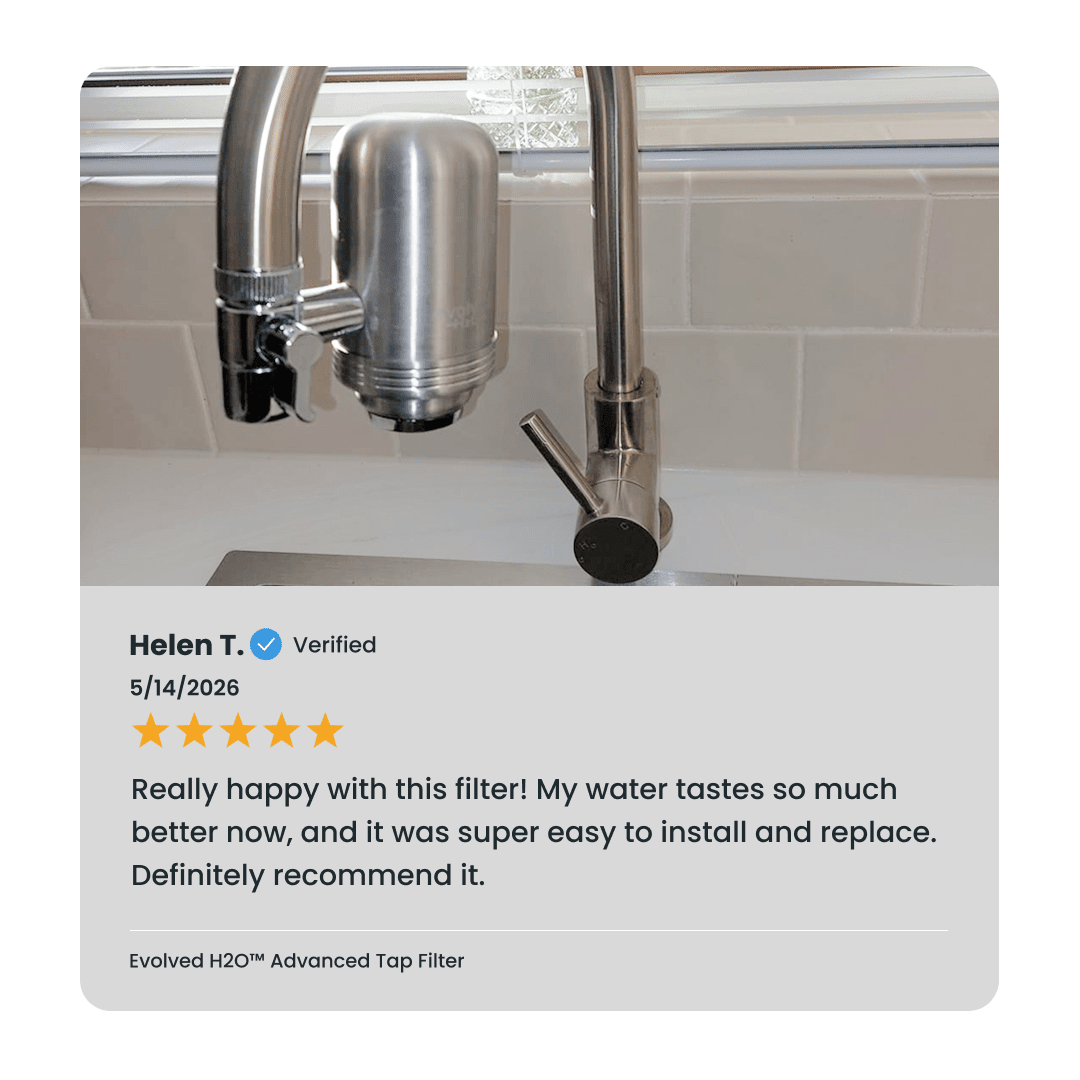 Evolved H2O Advanced Tap Water Filter installed on a kitchen tap with verified customer review