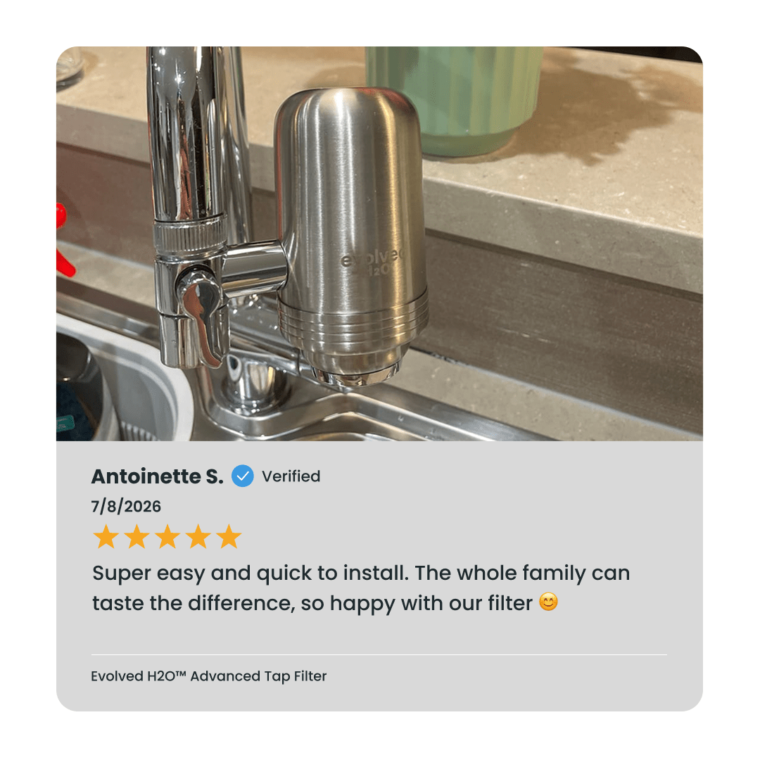 Evolved H2O Advanced Tap Water Filter installed on a kitchen faucet with verified customer review