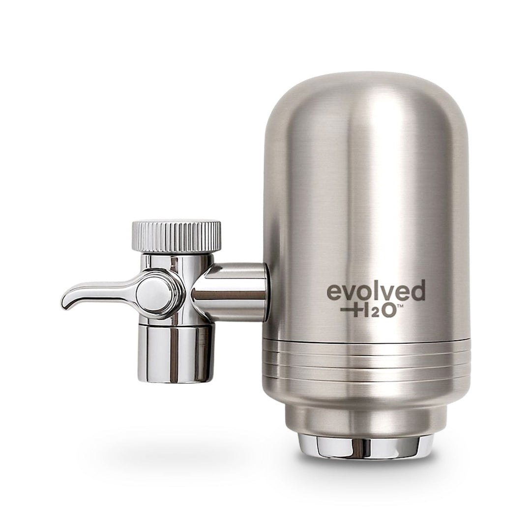 Evolved H2O stainless steel tap water filter with chrome diverter valve on a white background