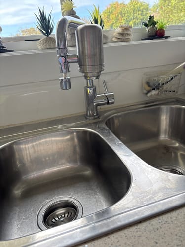 Customer photo of the Evolved H2O tap filter fitted by Karen B.
