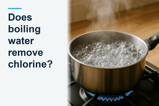 An open saucepan of water at a rolling boil, water boiling vigorously in an open pan on a stovetop, australian home kitchen