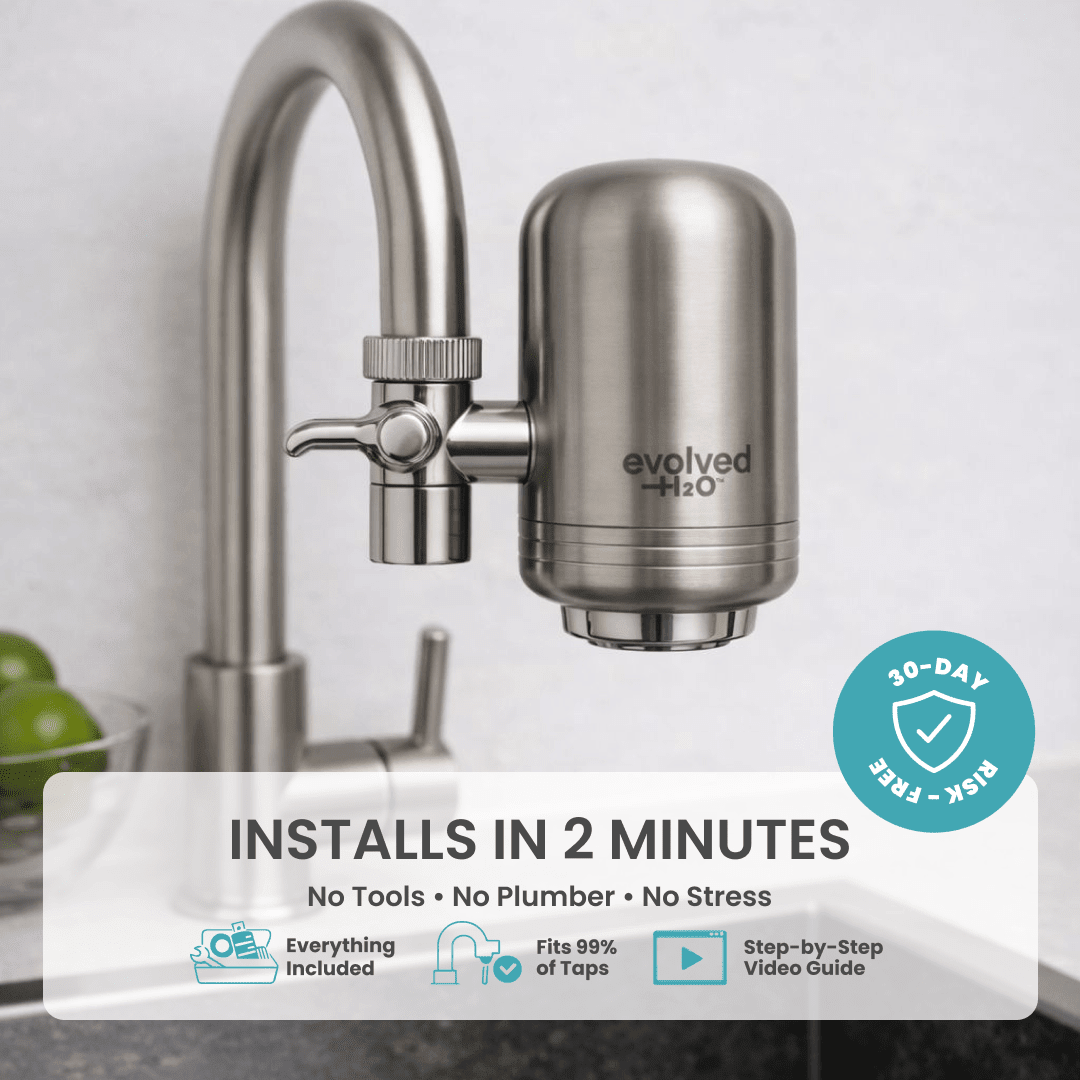 Evolved H2O kitchen sink water filter attached to modern stainless steel faucet