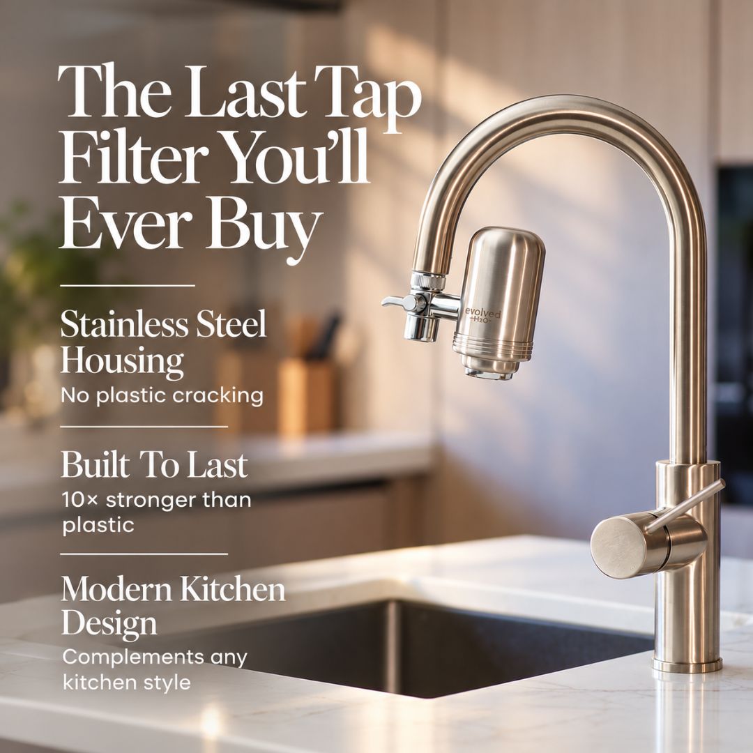 Evolved H2O stainless steel tap water filter installed on a modern kitchen faucet, highlighting durable metal construction