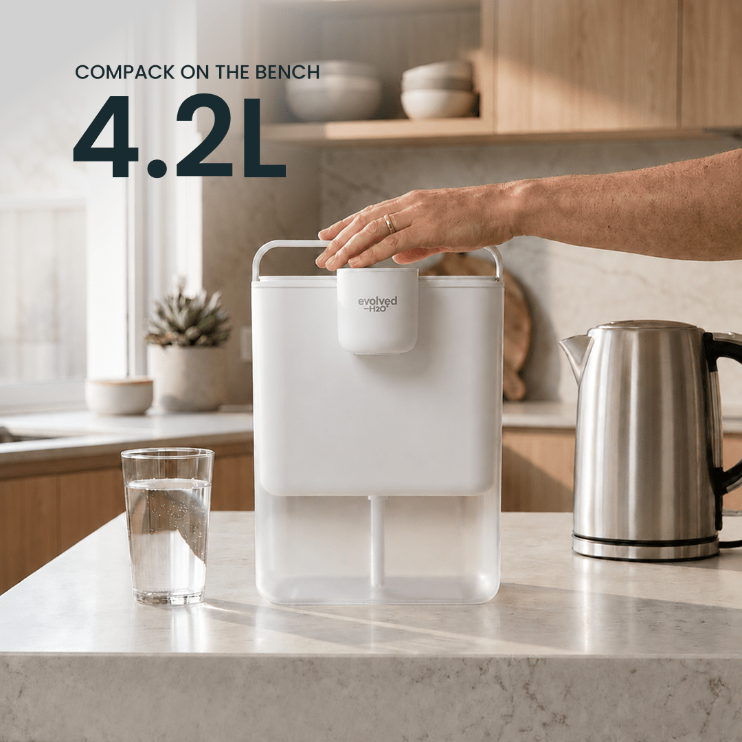 HydroX 4.2L water filter pitcher on a kitchen benchtop, showing its compact countertop design and large water capacity.