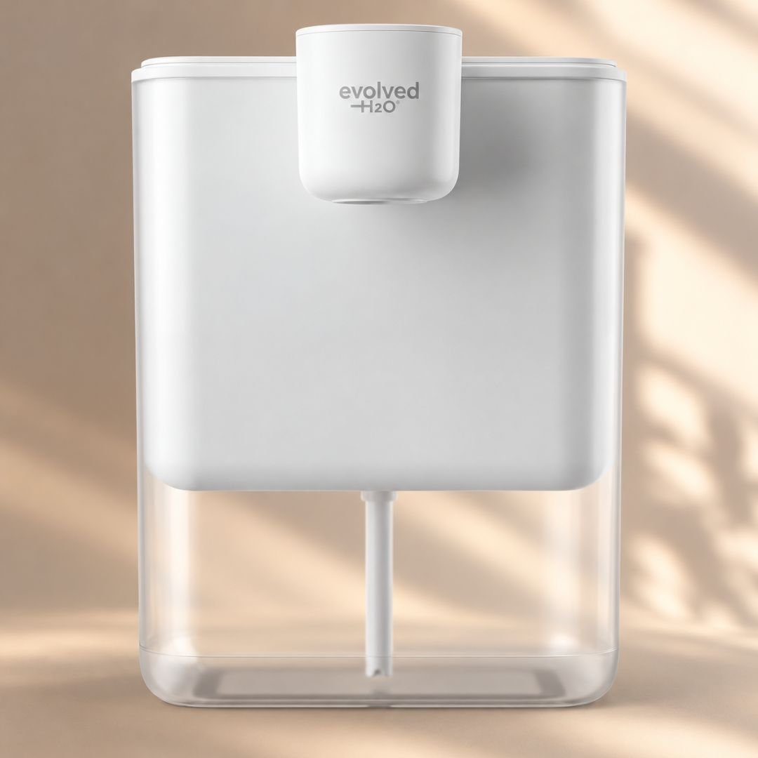 Evolved H2O HydroX electric water filter pitcher in white with transparent lower reservoir and front dispensing unit