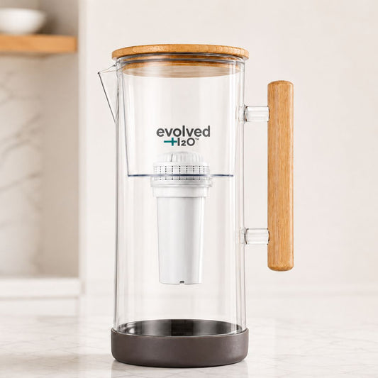 Evolved H2O 3.5L glass water filter jug with bamboo lid and handle.