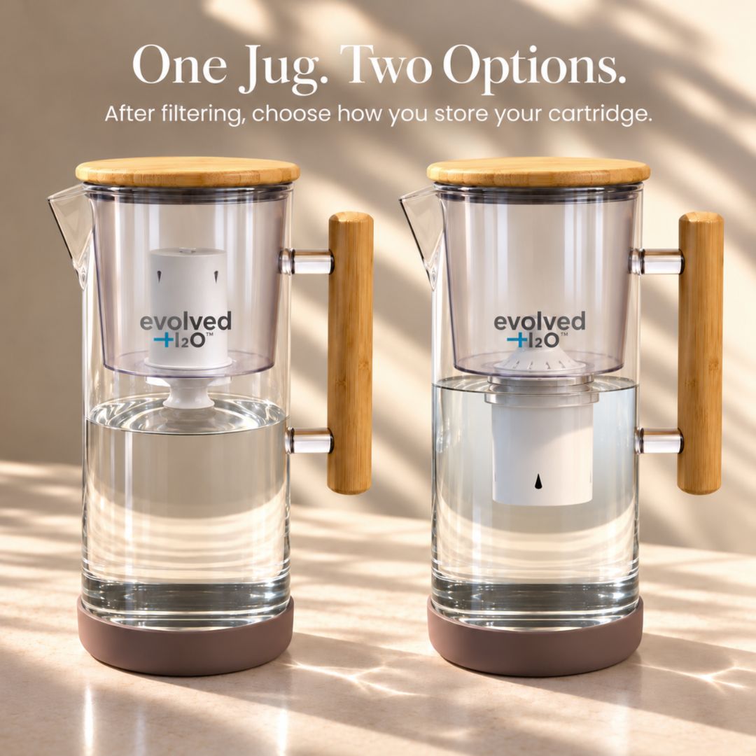 Evolved H2O glass water filter jug showing two cartridge storage positions after filtration, with the cartridge raised or lowered inside the jug