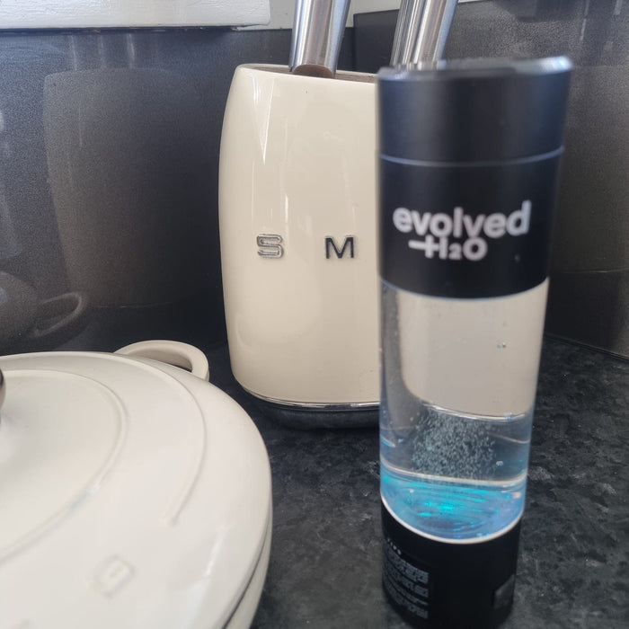 Customer photo of the Evolved H2O hydrogen water bottle on a kitchen bench