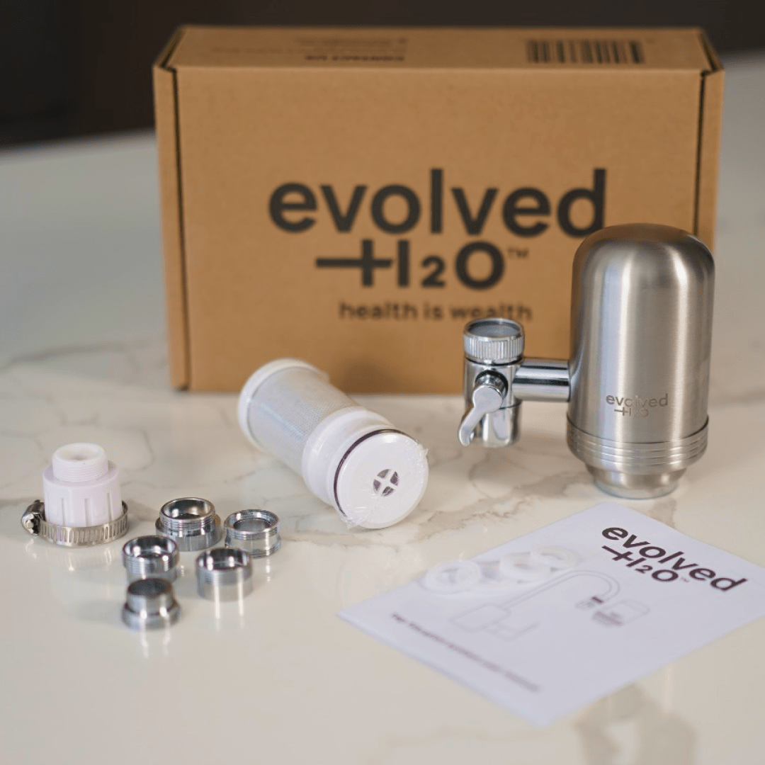 Evolved H2O tap filter packaging with included adapters and installation accessories