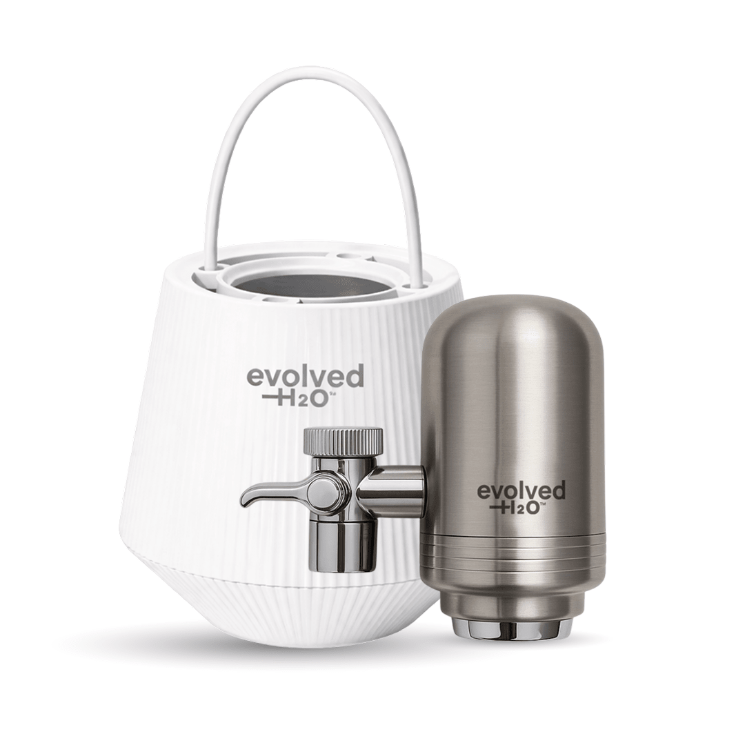 Evolved H2O tap and bath filter bundle with a white bath filter unit, stainless steel tap filter, and metal diverter attachment on a white background