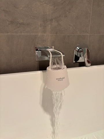 Customer photo of the Evolved H2O bath filter on a wide bath tap