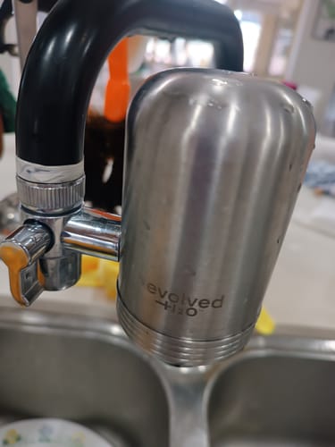 Customer photo of the Evolved H2O tap filter fitted by Grace G.