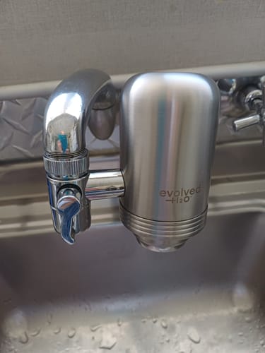 Customer photo of the Evolved H2O tap filter fitted by Lynda O.